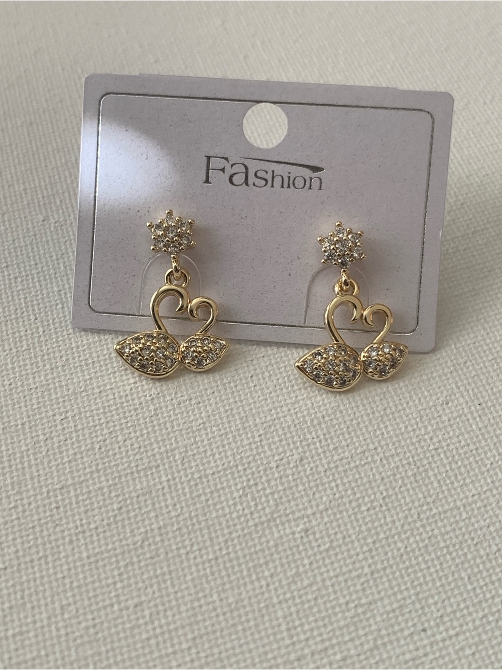 Gold-Tone Swan Drop Earrings with Crystal Accents